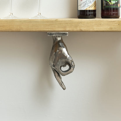 silver hand shaped bottle opener